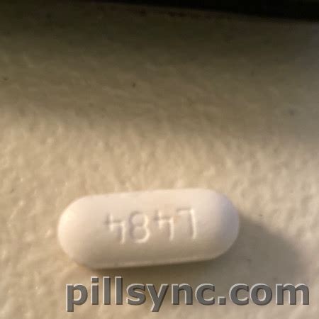 l484 white oval pill